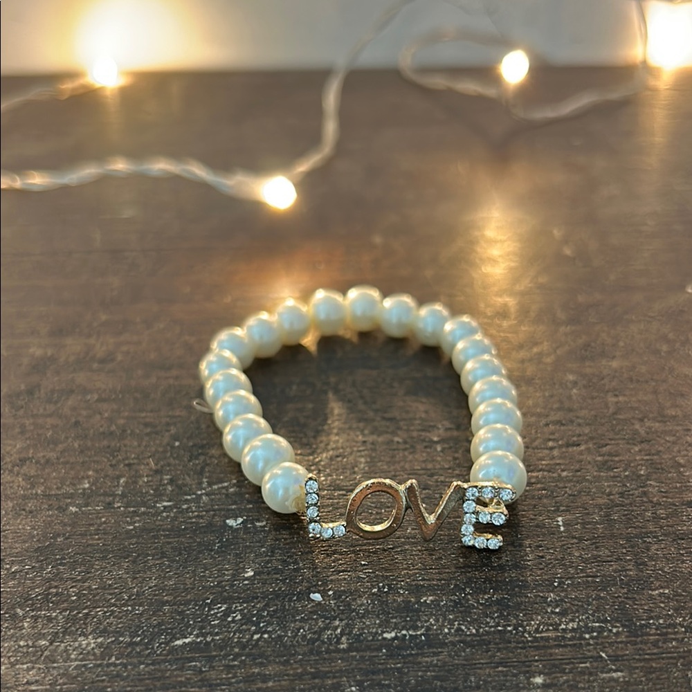 Elegant Pearl Bracelet with Gold and Silver Accents